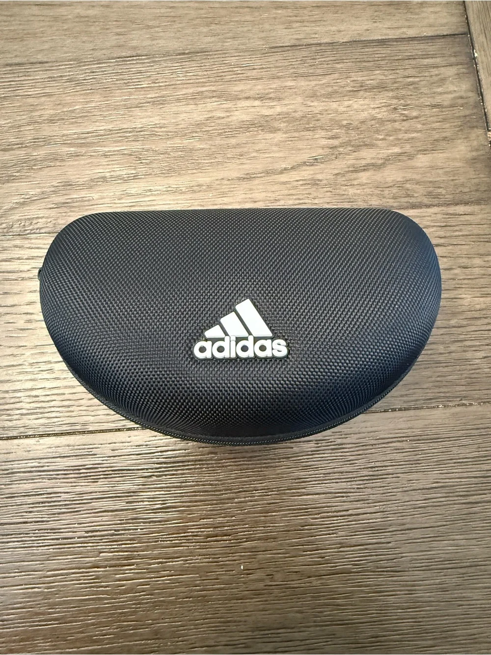 Adidas Sport SP0077 rimless shield sunglasses feature a white/red frames